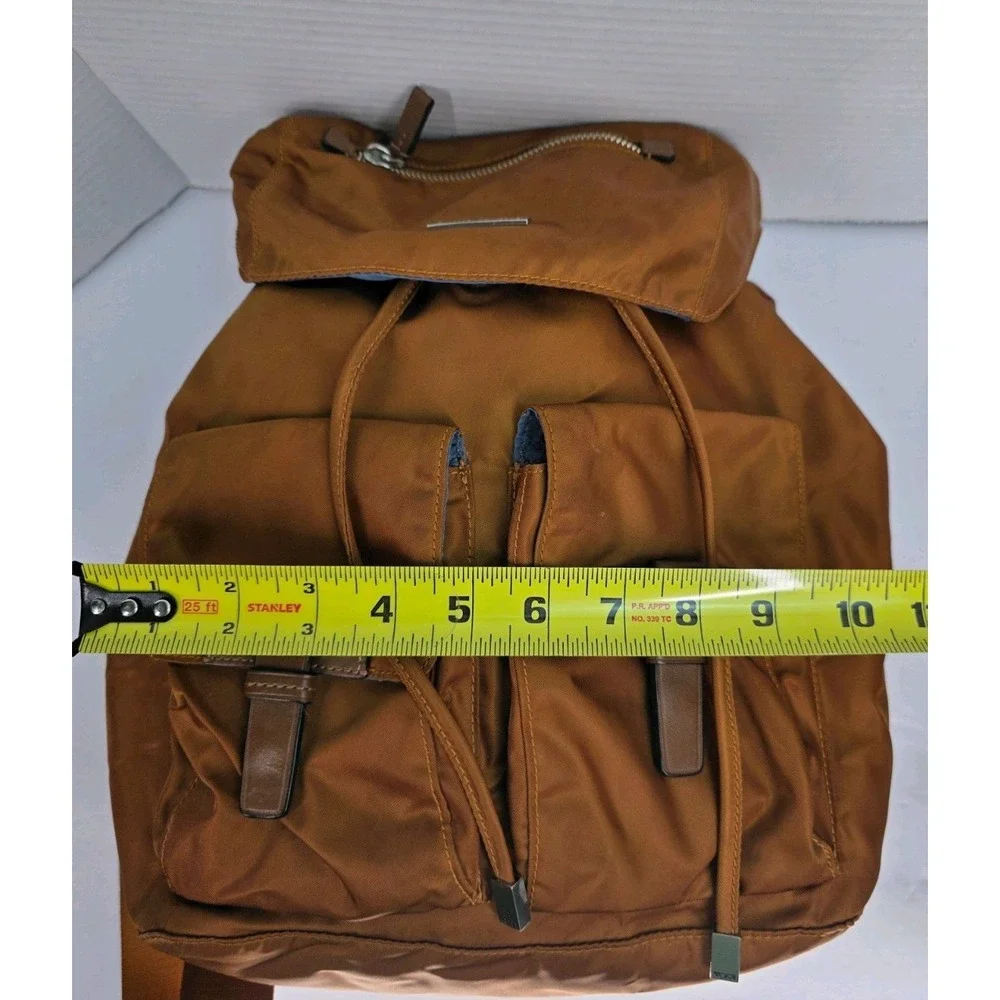 Tumi 48787 Voyageur Basel Backpack in a brown‎ nylon material